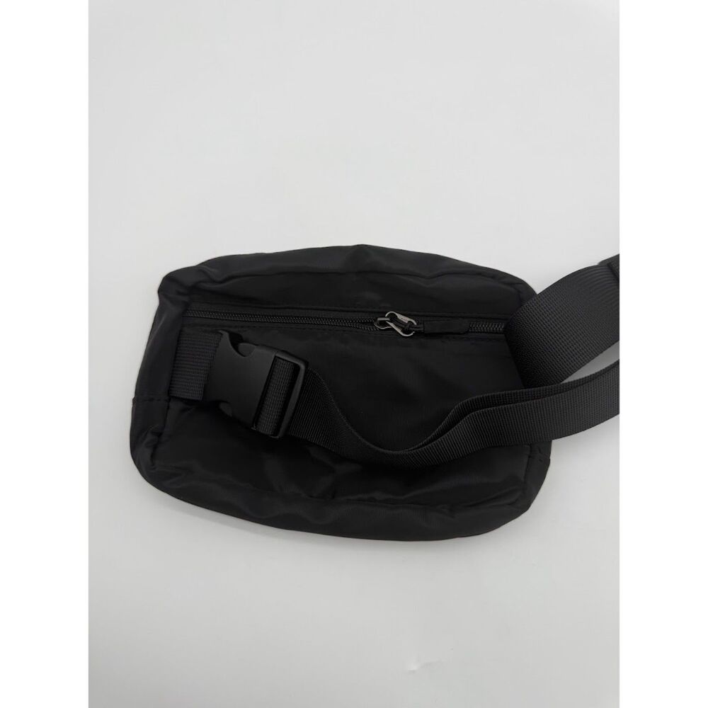 Fanny pack Black belt bag with a purple initial 'V' patch. - Picture 3 of 5